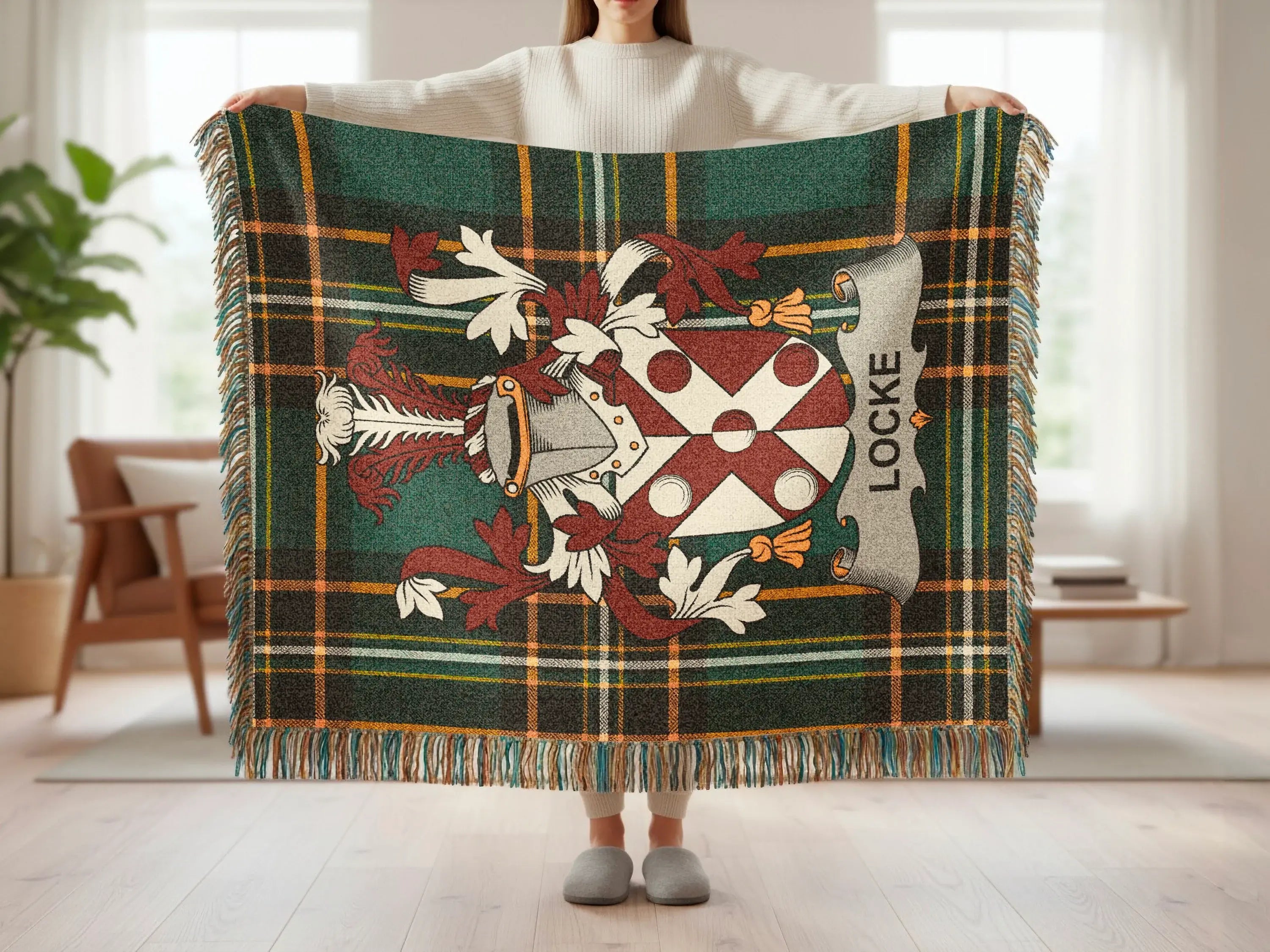 Tartan throw blanket with Locke crest and fringe.