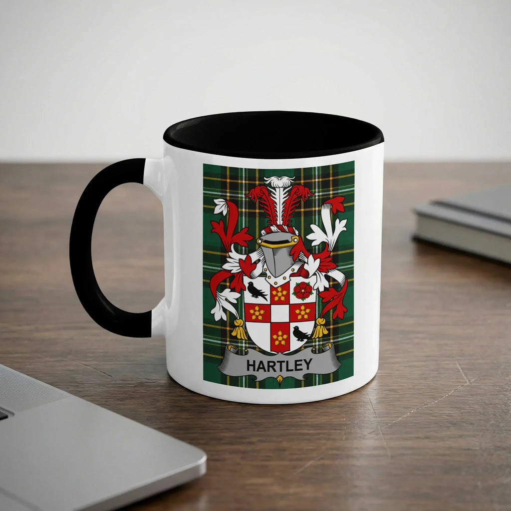 White mug with black rim featuring the Hartley family coat of arms.