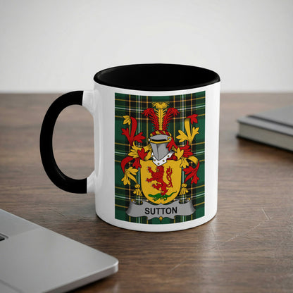 White mug with black rim featuring a coat of arms with "Sutton" below.
