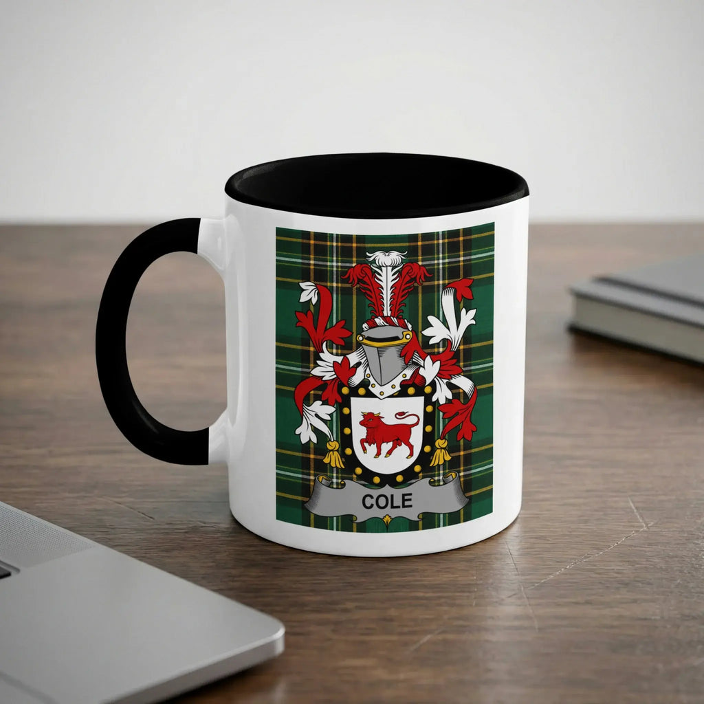 White mug with black rim featuring the Cole family crest on a tartan background.