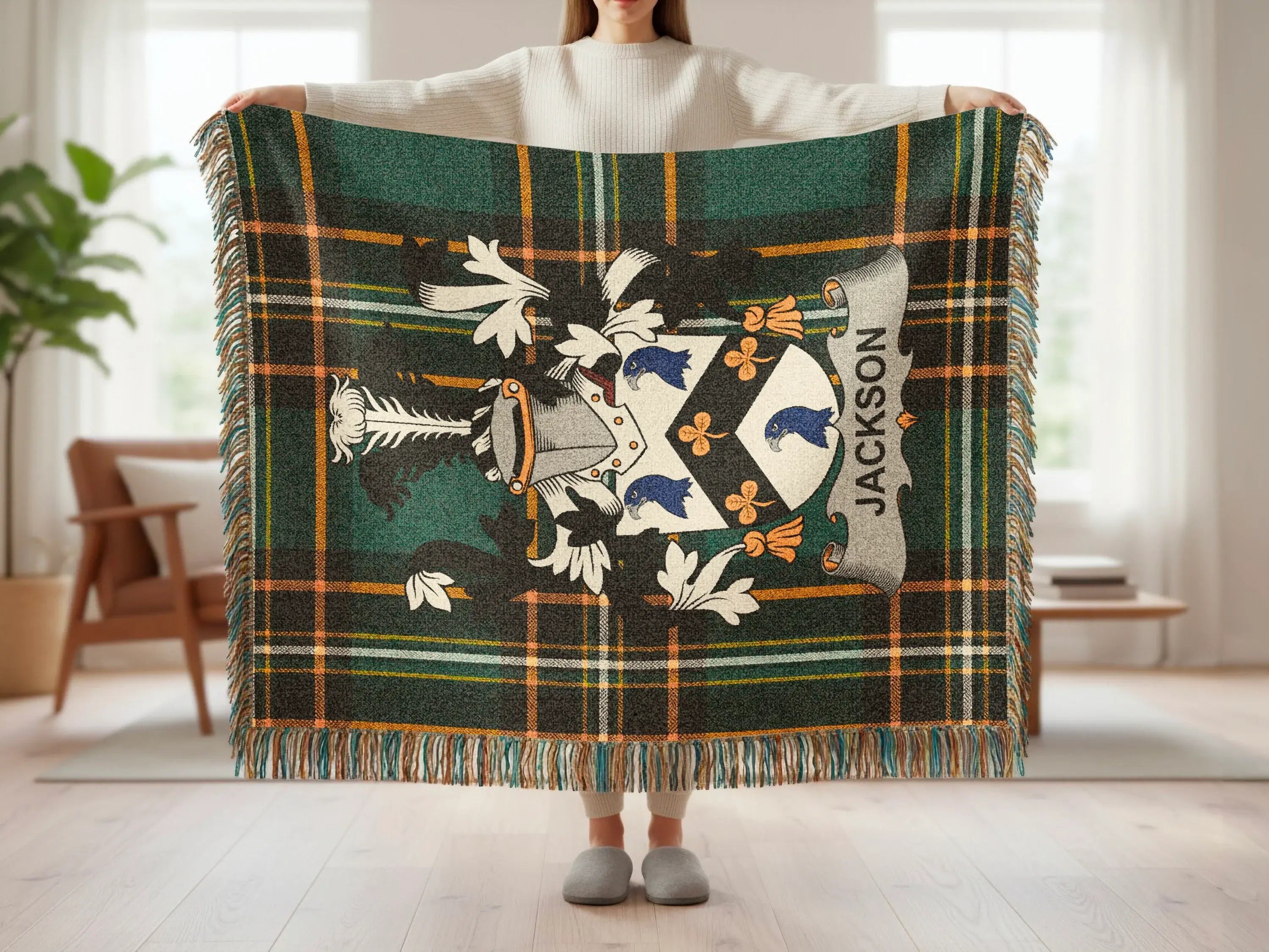 Tartan throw with family crest and "Jackson" banner.