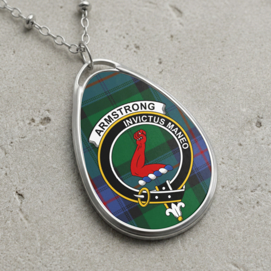 Armstrong clan Scottish tartan necklace with clan crest on tartan background