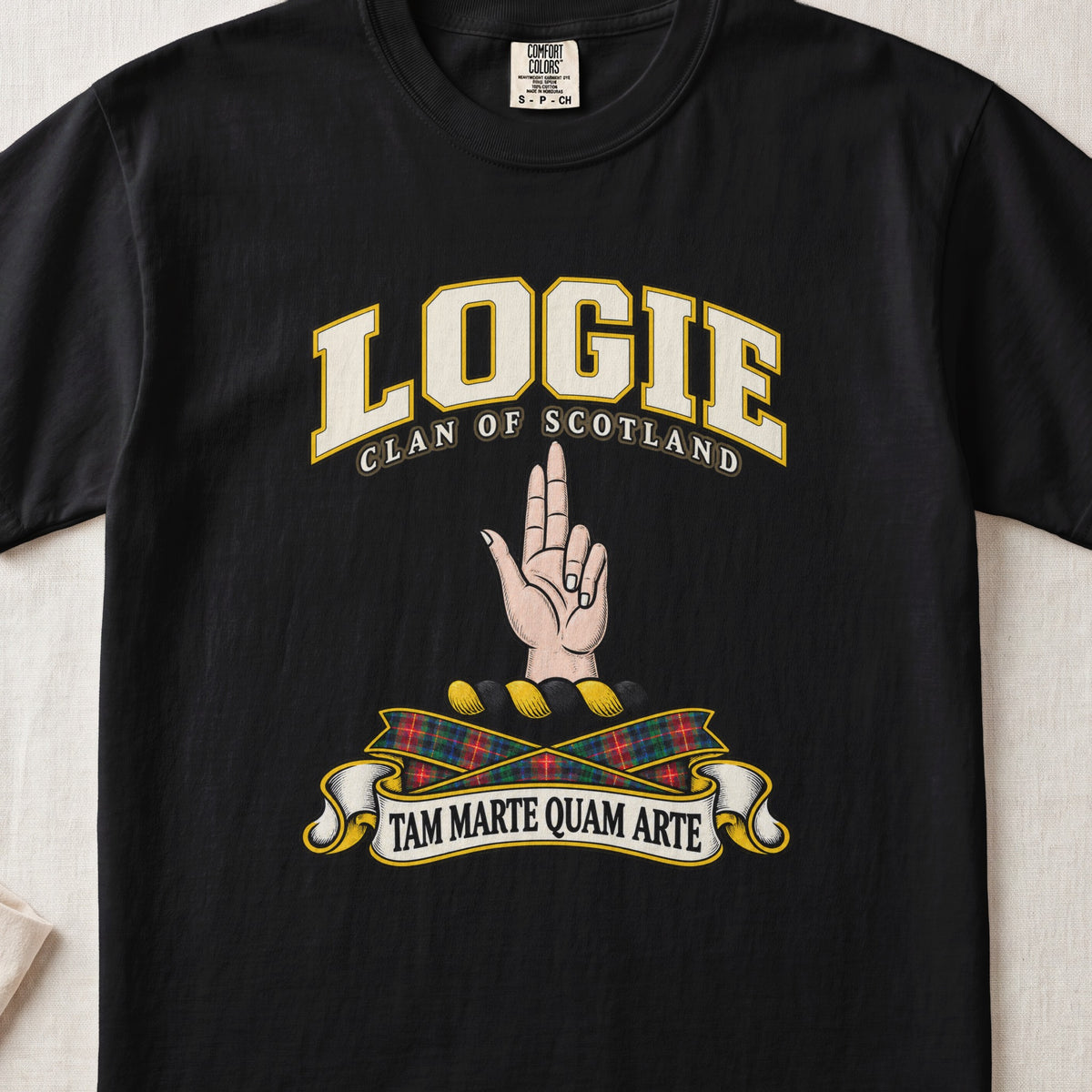 Logie Scottish clan T-shirt in Black, front view with a raised hand with two fingers extended and motto design.