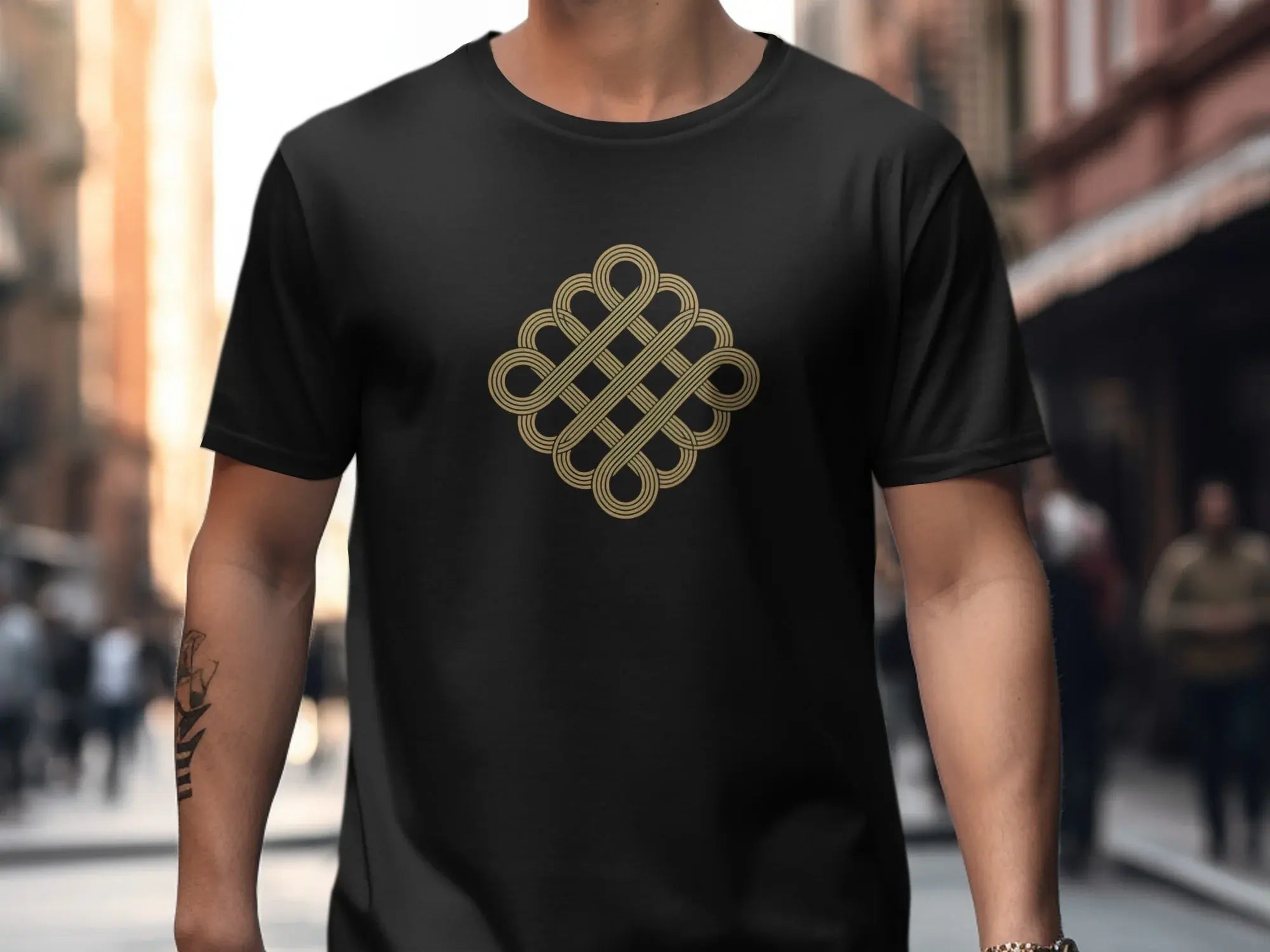 Intricate Golden Knot Design on Black T-Shirt