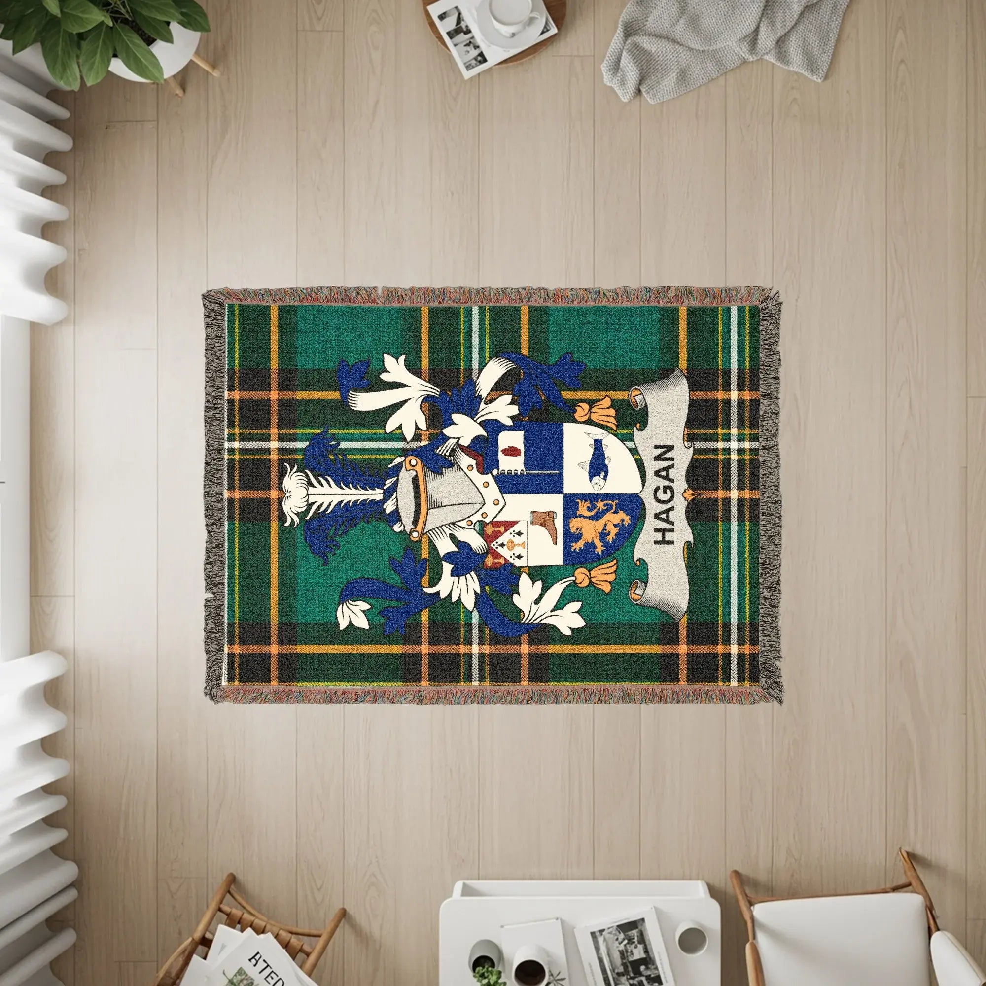 Hagan family crest on a tartan woven throw blanket.