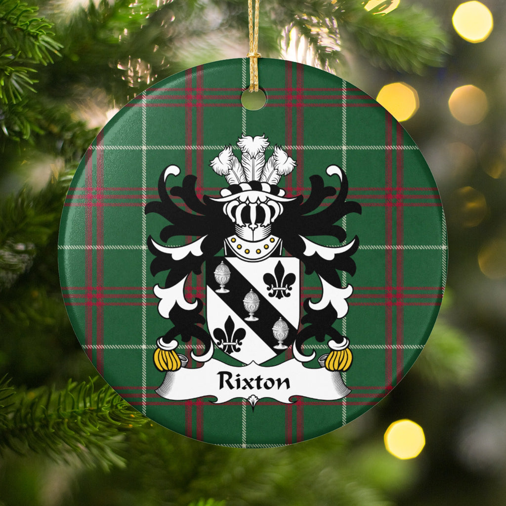 Rixton Welsh National Tartan ornament hanging on a lit Christmas tree, featuring a black diagonal band with three silver covered cups between black fleurs-de-lis.