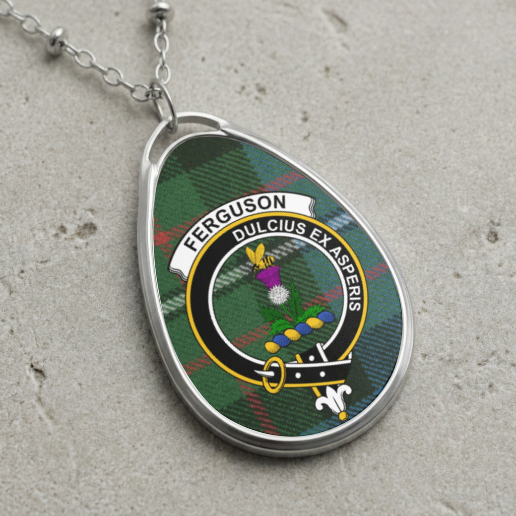 Ferguson clan Scottish tartan necklace with clan crest and Dulcius Ex Asperis motto on tartan background