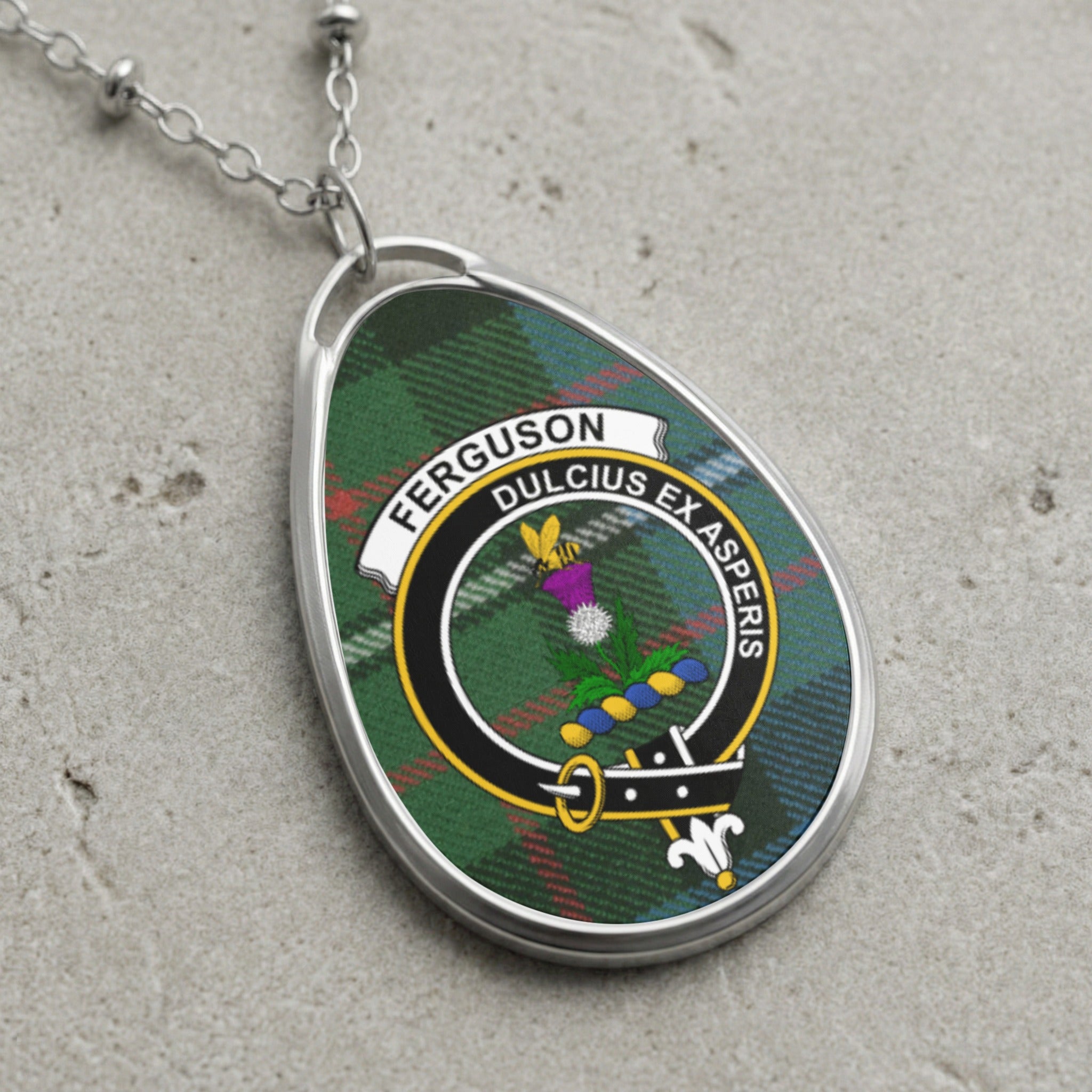 Ferguson clan Scottish tartan necklace with clan crest and Dulcius Ex Asperis motto on tartan background