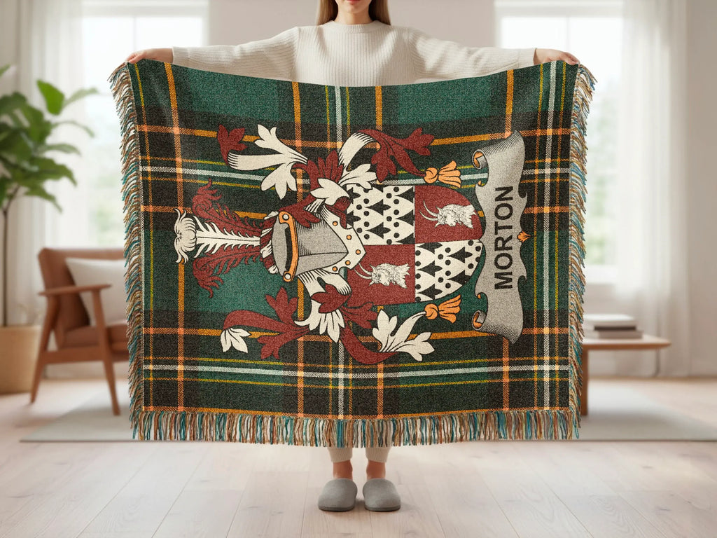Tartan blanket with a coat of arms featuring the name MORTON.