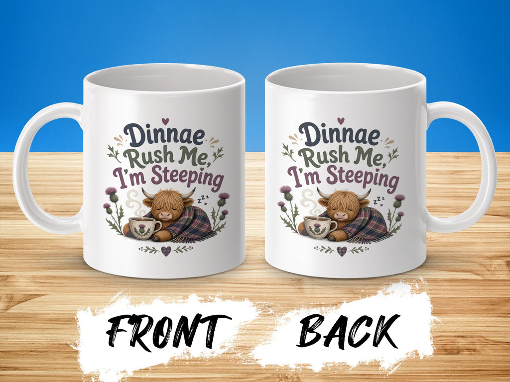 Mug with sleepy Highland cow, tea, and text "Dinnae Rush Me, I'm Steeping".