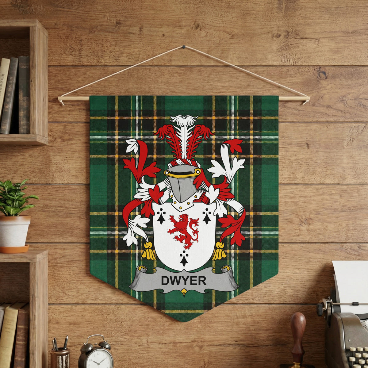 Dwyer family crest on green tartan banner, hanging on wood paneled wall.