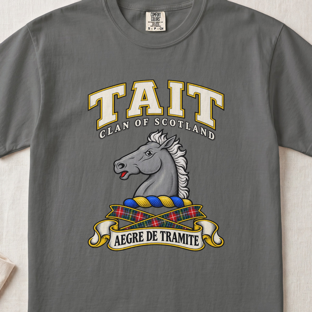Tait Scottish clan T-shirt in Pepper, front view with a gray horse head and motto design.