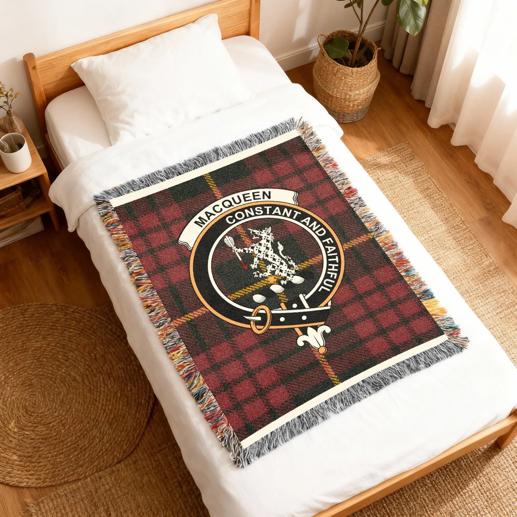 MacQueen Constant and Faithful woven blanket — close-up of clan emblem woven into cotton yarn
