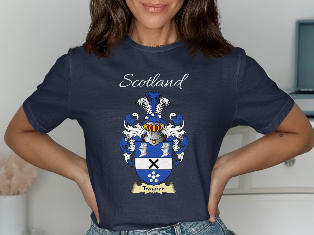 Model wearing the navy Traynor family crest T-shirt featuring “Scotland” and the surname banner.