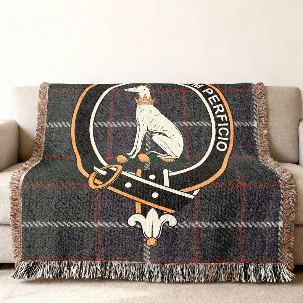 Hunter clan crest with crowned greyhound woven into tartan throw blanket