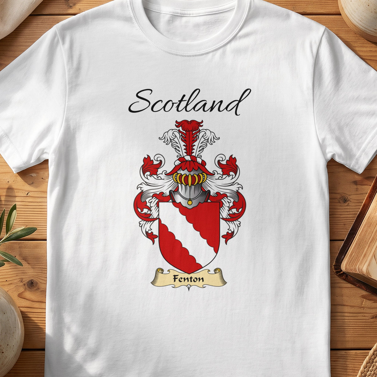 White Fenton Scottish family shield T-shirt featuring a white scalloped diagonal band on red