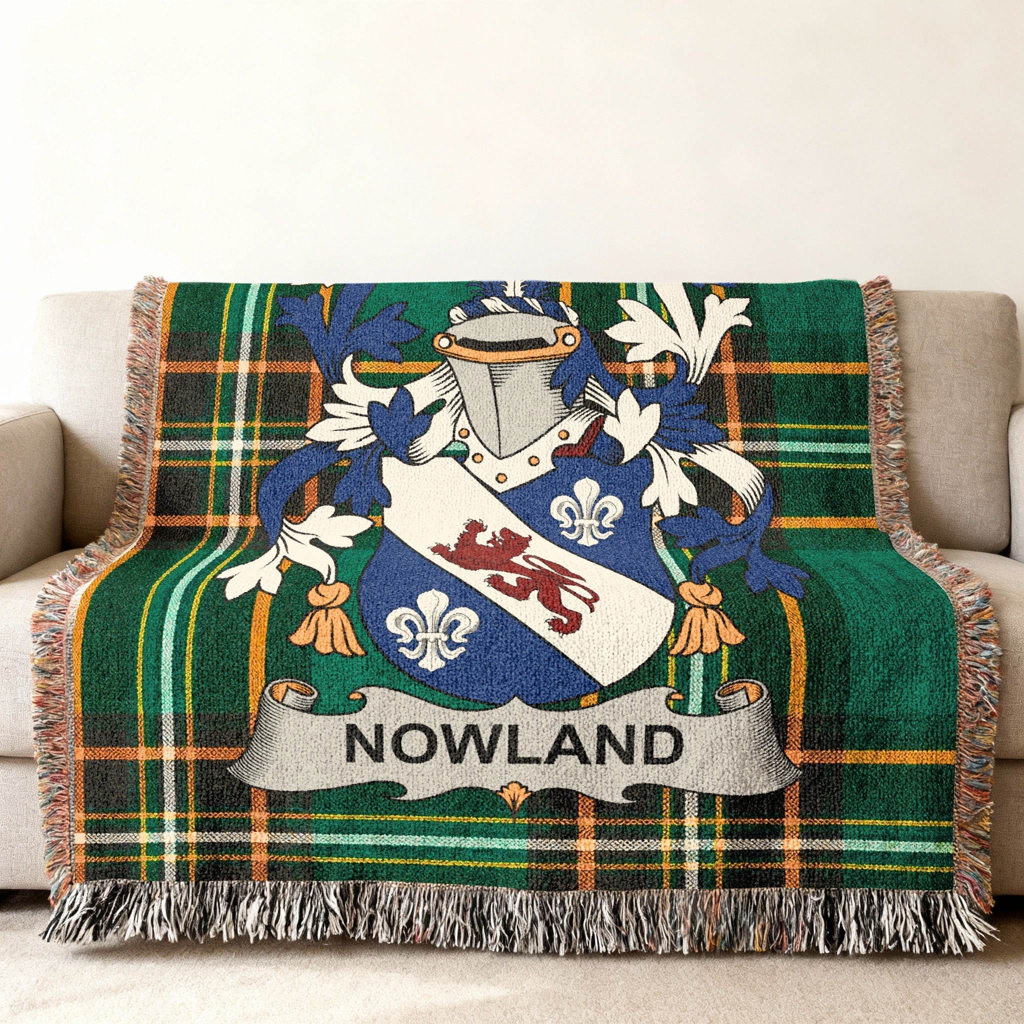 Nowland family crest woven into a green plaid throw blanket.