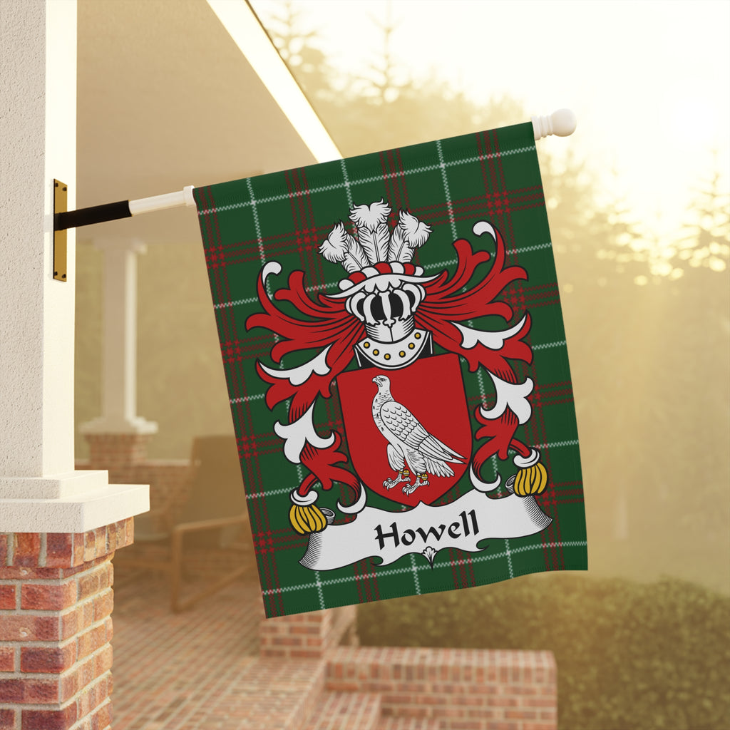 Howell family crest on a dark green plaid flag.