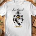 White Binning Scottish family shield T-shirt featuring a pale linked-hands motif on a black diagonal band