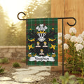 Vaughan family crest on a green plaid garden flag.