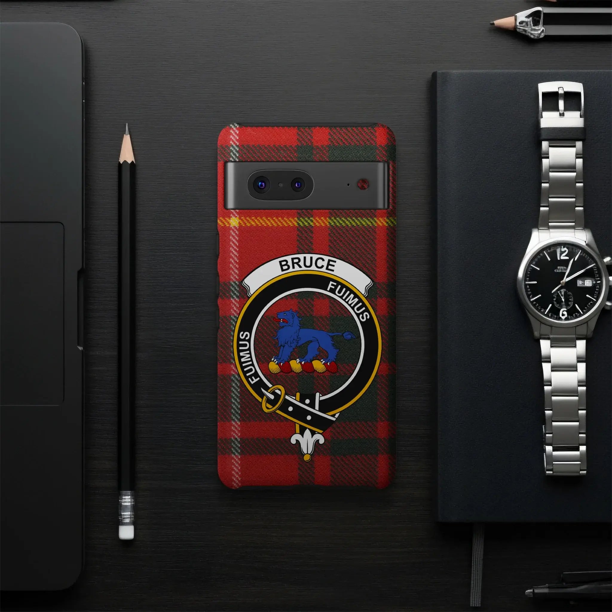 Bruce tartan phone case flat lay — full red-yellow clan crest print with Fuimus blue lion