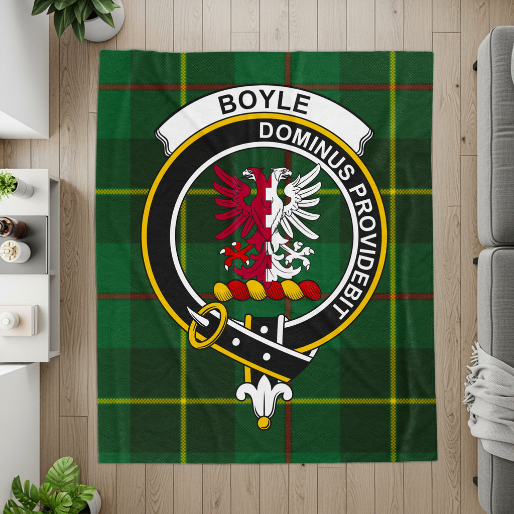Boyle crest and motto on green tartan printed throw — detail view