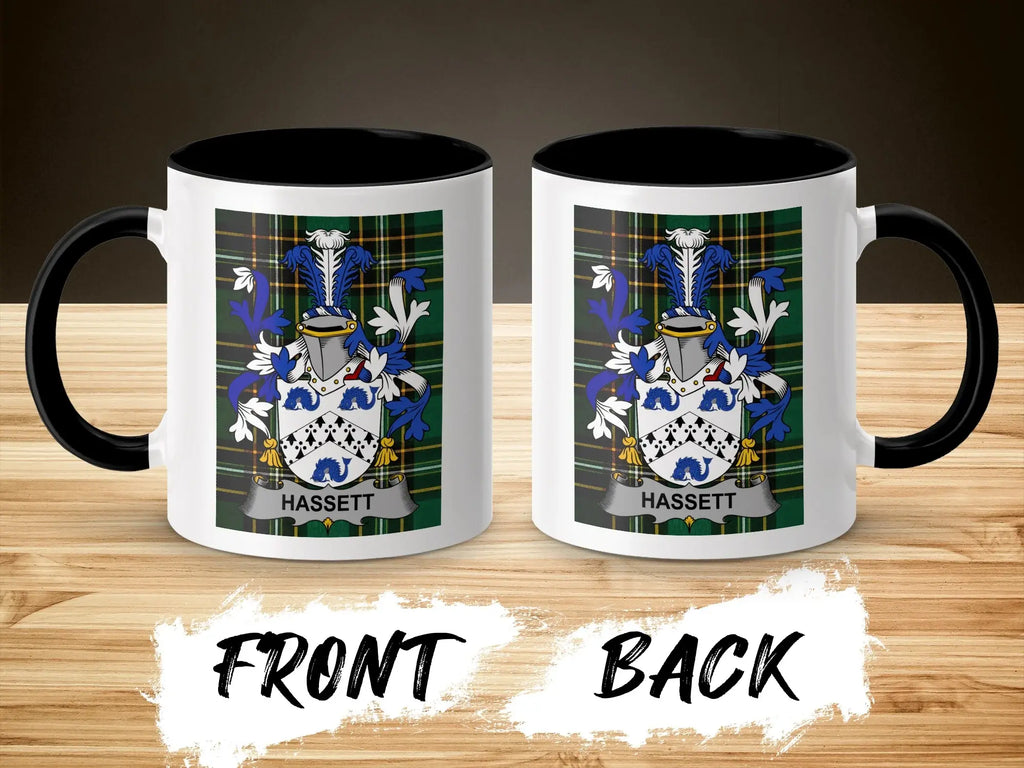 Two white ceramic mugs with black rims, displaying the Hassett coat of arms.