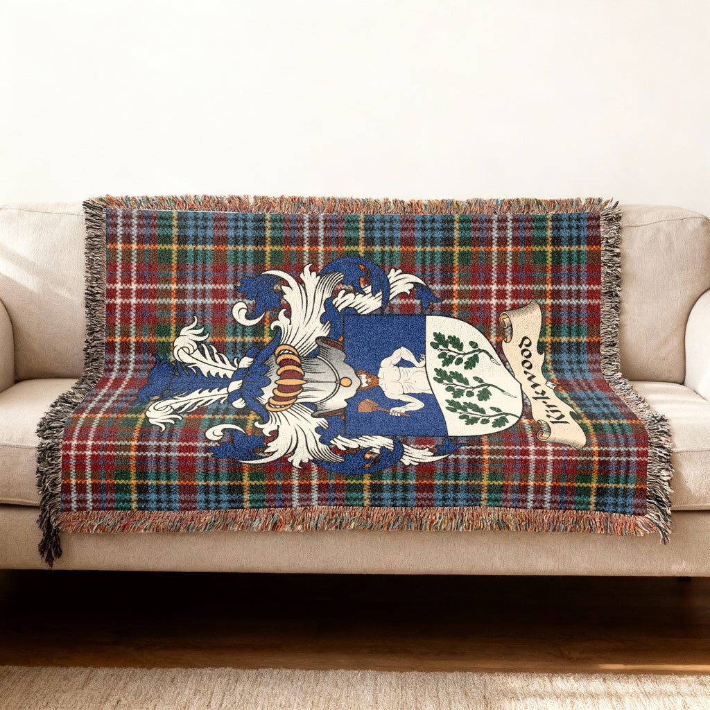 Kirkwood Scottish woven blanket with family shield and Caledonia tartan background