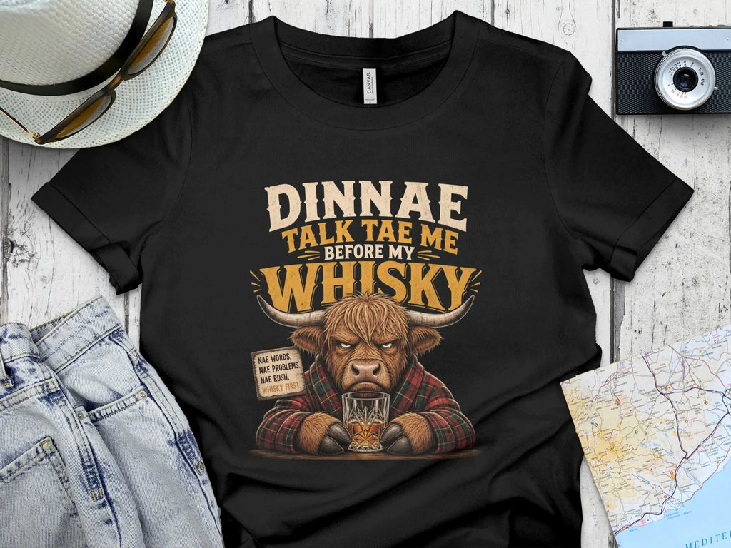 T-shirt with a Highland bull saying "Dinnae talk tae me before my whisky."