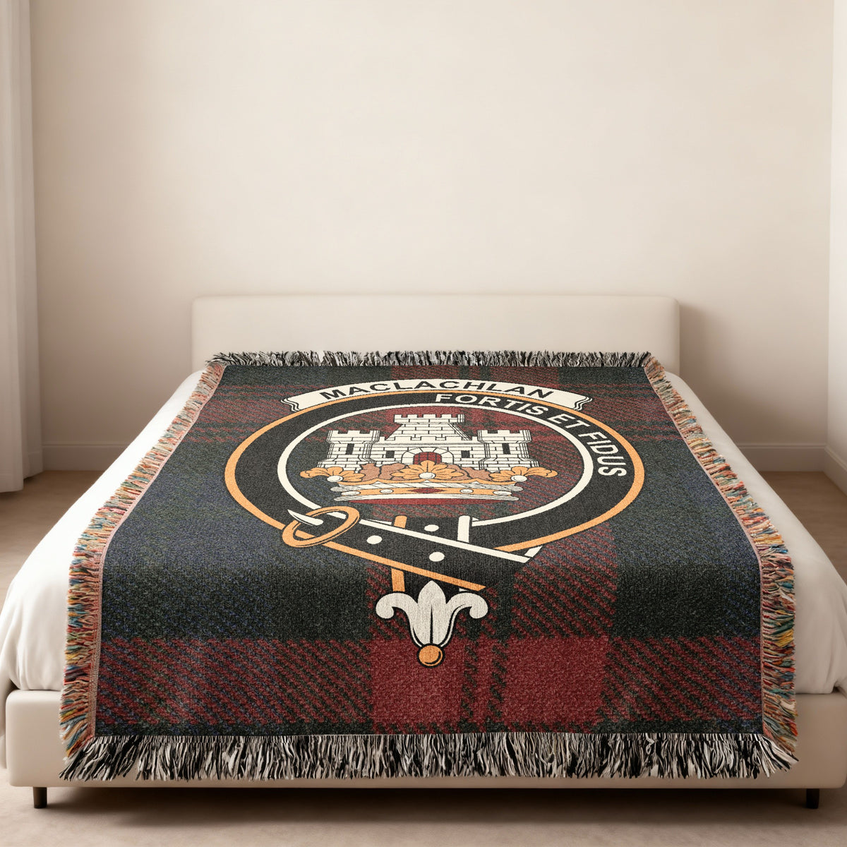 MacLachlan Scottish woven blanket spread across a bed, showing the full crest design and tartan background