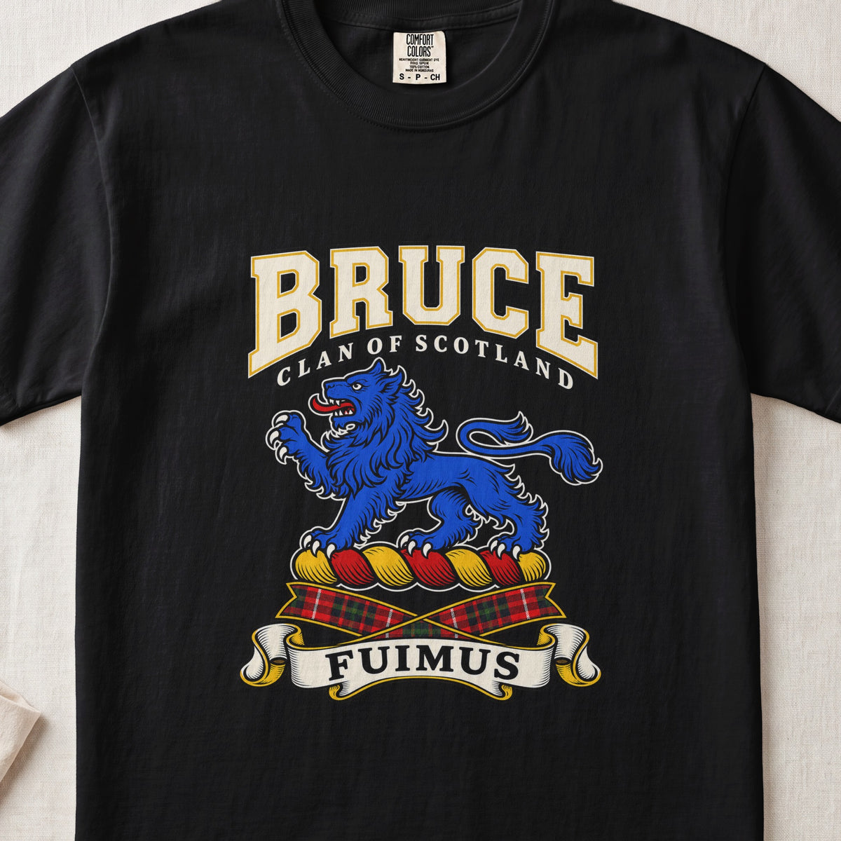 Black Bruce Scottish clan T-shirt, front flat lay with varsity lettering, blue lion crest and Fuimus motto.