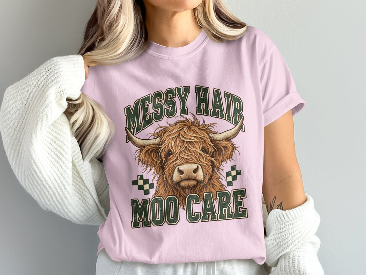 Model wearing the Messy Hair, Moo Care Highland cow Comfort Colors T-shirt in Blossom