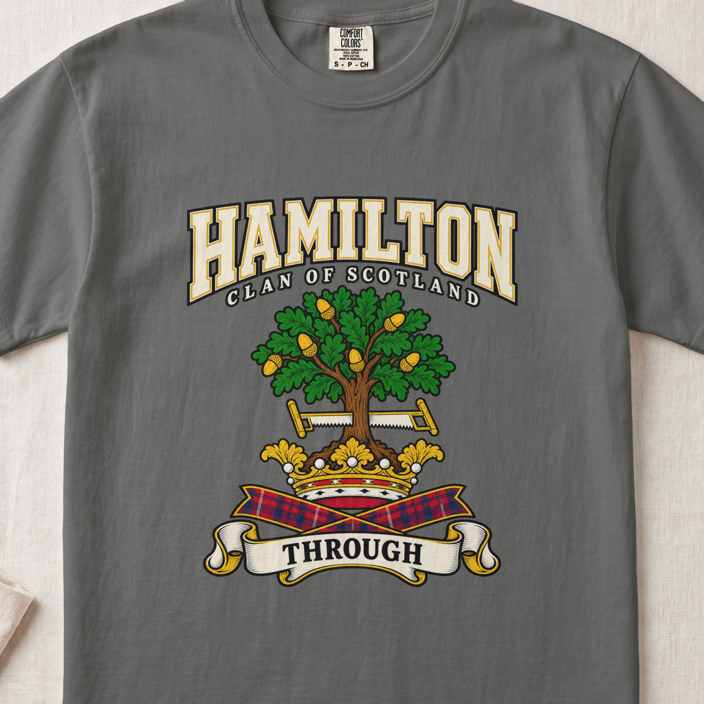 Hamilton graphic T-shirt in Pepper gray, front flat lay showing varsity lettering and green oak-like tree with gold acorns.