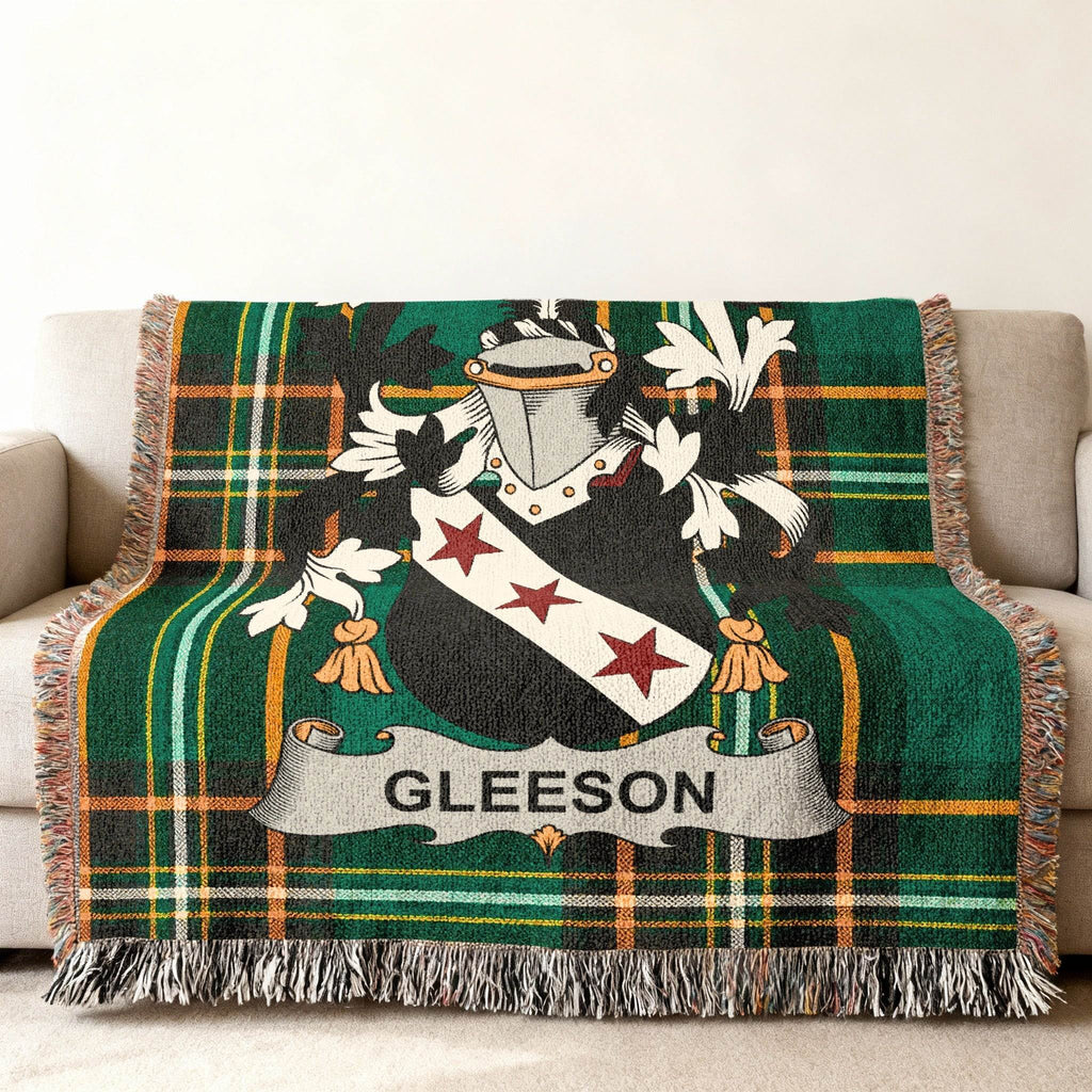 Plaid throw blanket featuring the GLEESON family crest.