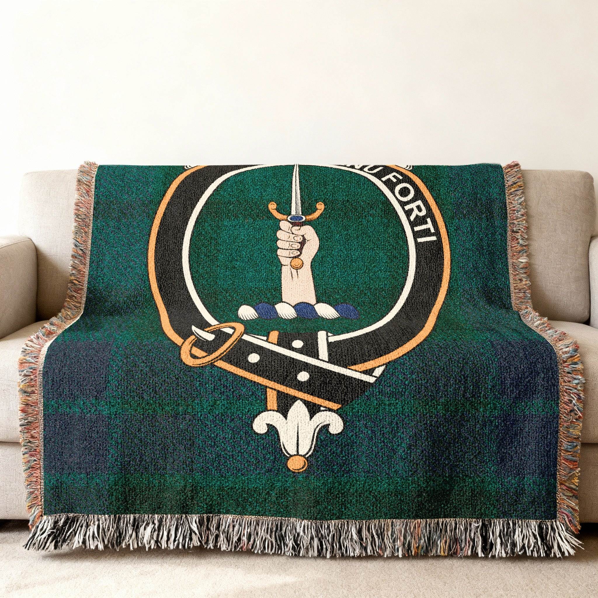MacKay clan crest tartan throw woven blanket with sword and knot design — fringe edge visible