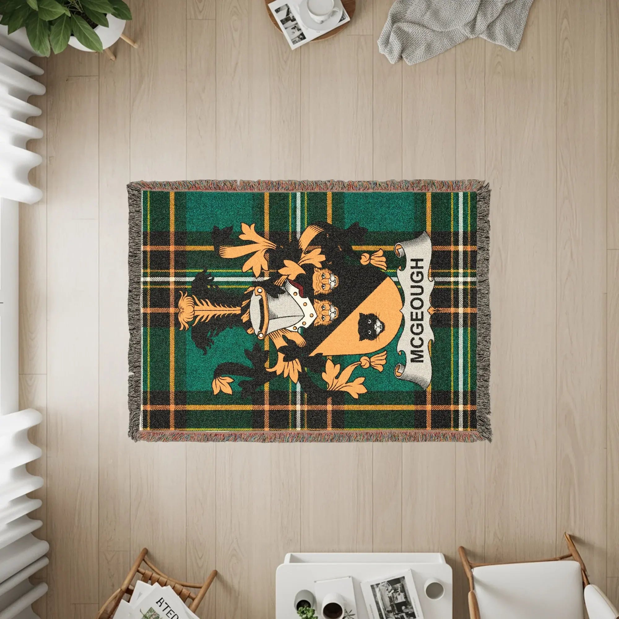 Tartan blanket with the McGeough family crest.