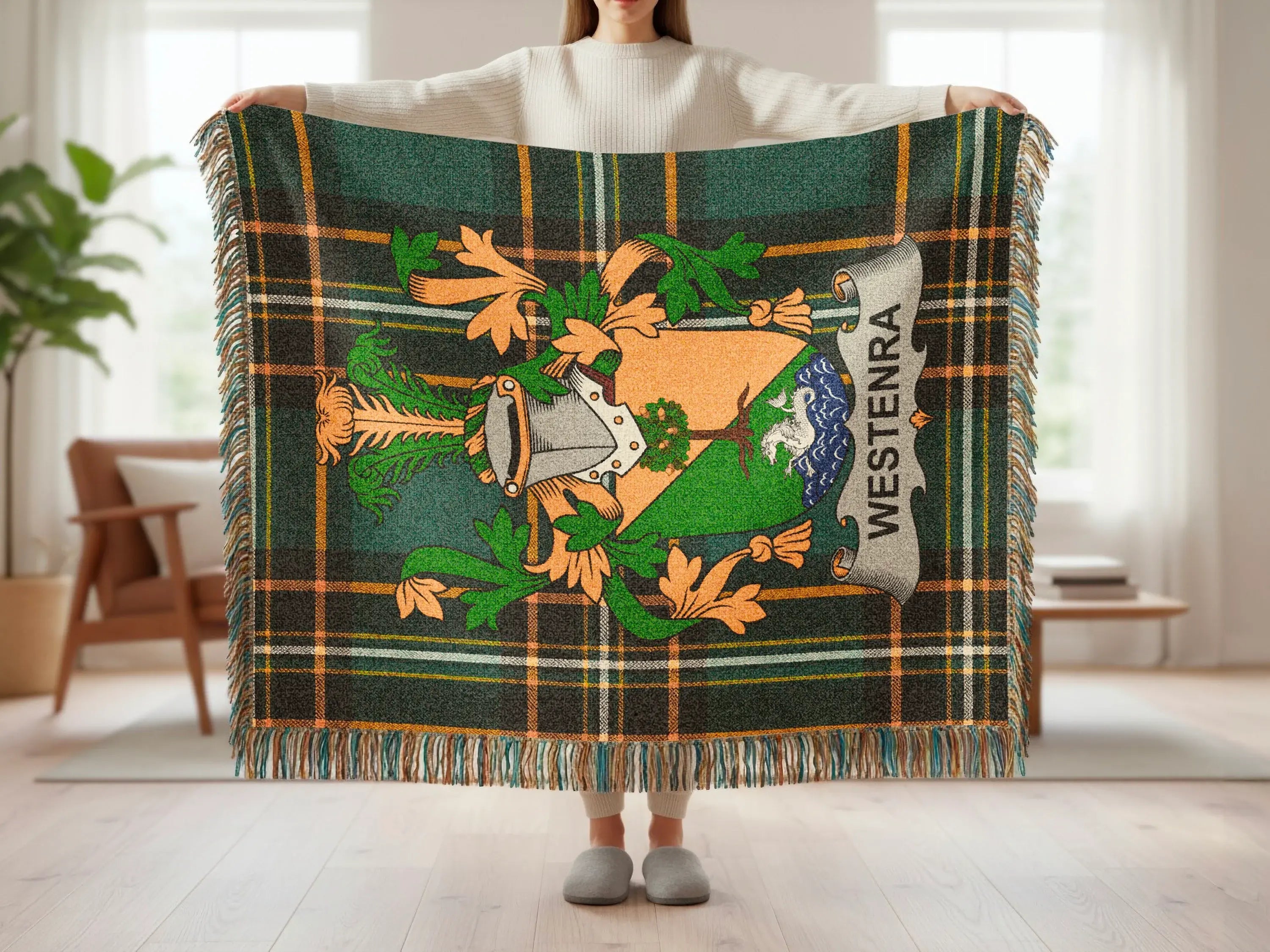 Green tartan plaid blanket with a coat of arms displaying WESTENRA.