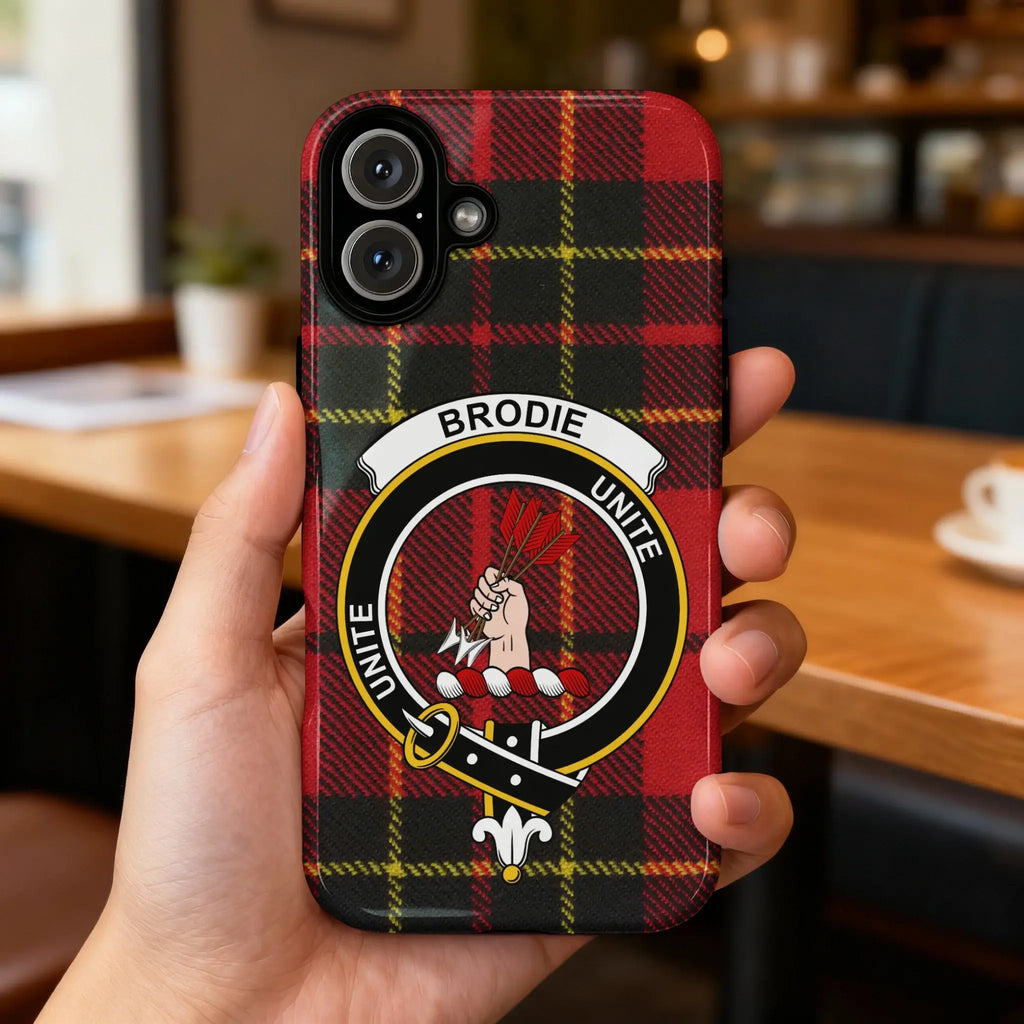 Clan Brodie Unite tartan case on iPhone — red plaid crest, glossy surface