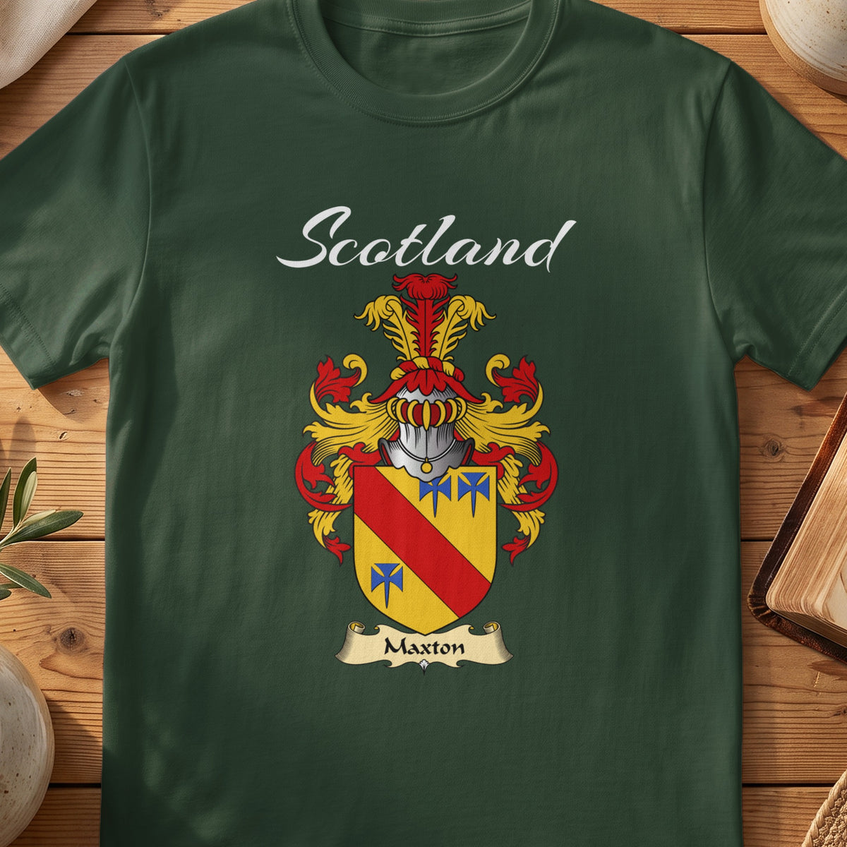 Forest Green Maxton Scottish T-shirt featuring a red diagonal band and blue motifs on gold