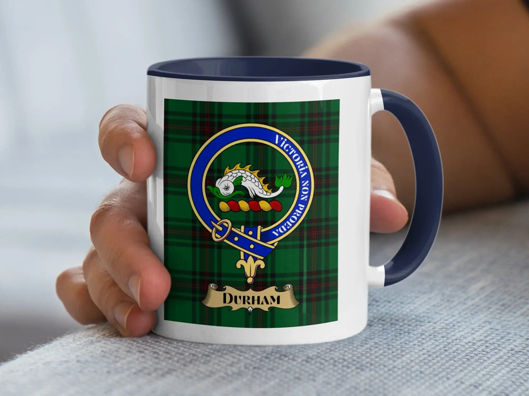 Durham family crest coffee mug with a tartan-background design