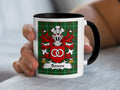 Mug with Bowen coat of arms on a green tartan background.