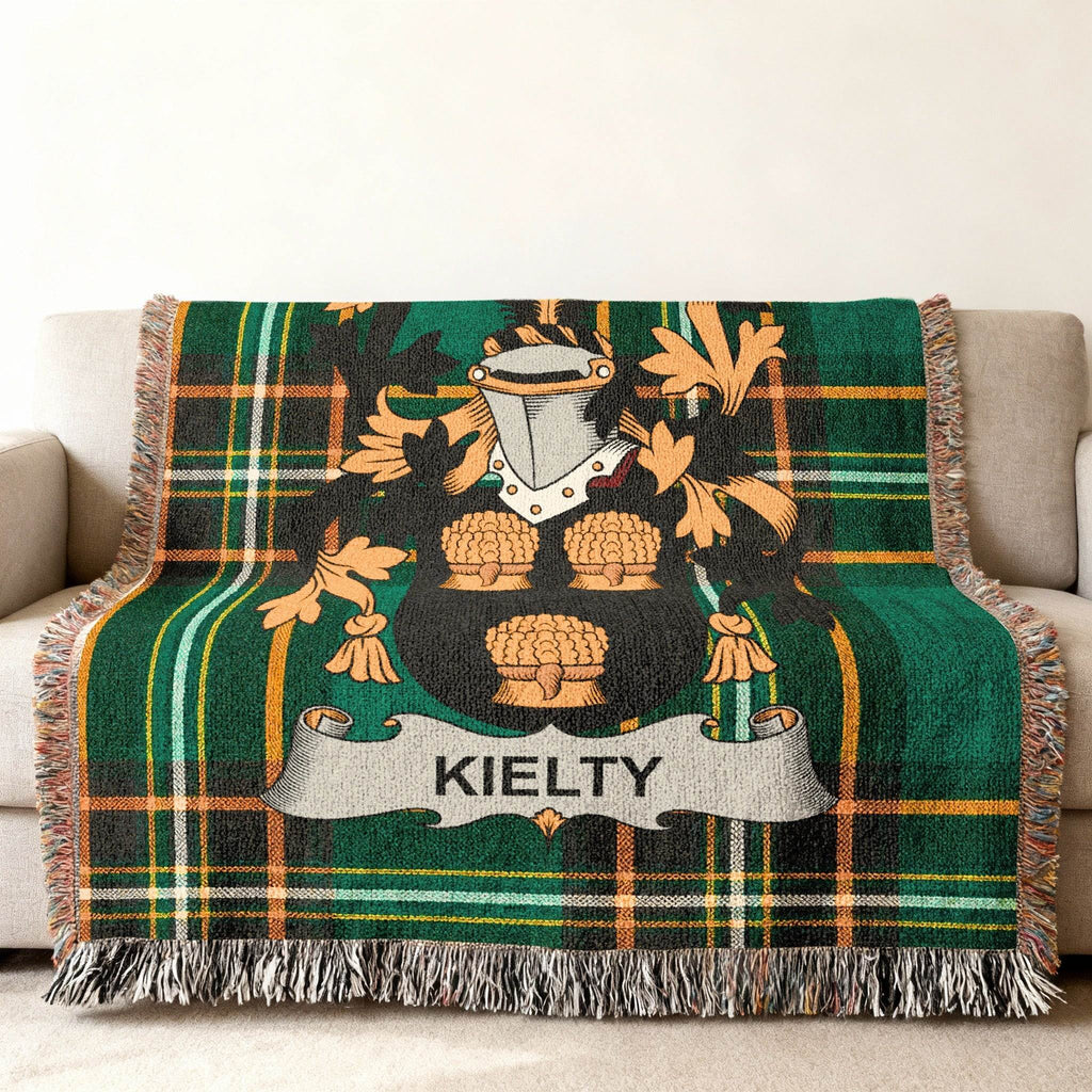 Kilty tartan throw blanket with a family crest and the name "KIELTY".