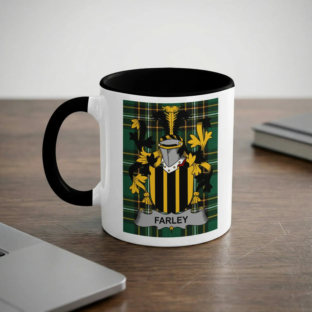 Mug with Farley family crest on plaid background, black handle.