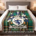 Fitz-Rery tartan blanket with a coat of arms and fringed edges on a bed.