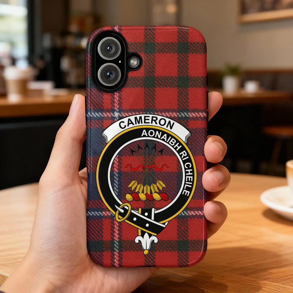 Cameron clan crest tartan phone case on iPhone — edge-to-edge red design with Aonaibh Ri Chéile