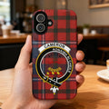Cameron clan crest tartan phone case on iPhone — edge-to-edge red design with Aonaibh Ri Chéile