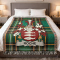 Tartan blanket with Roche family crest featuring three fish.