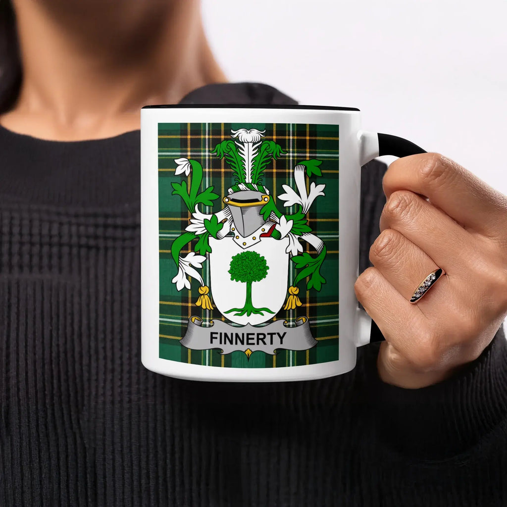 Mug with Finnerty coat of arms on plaid background.