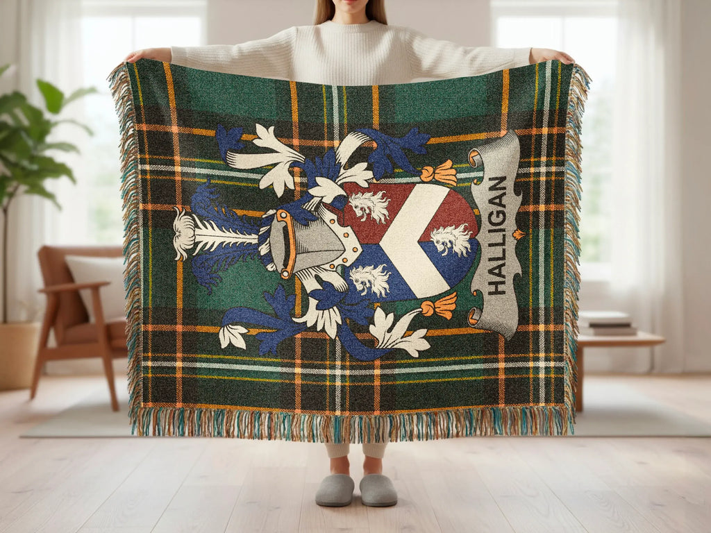Green tartan blanket with family crest and "HALLIGAN" text.
