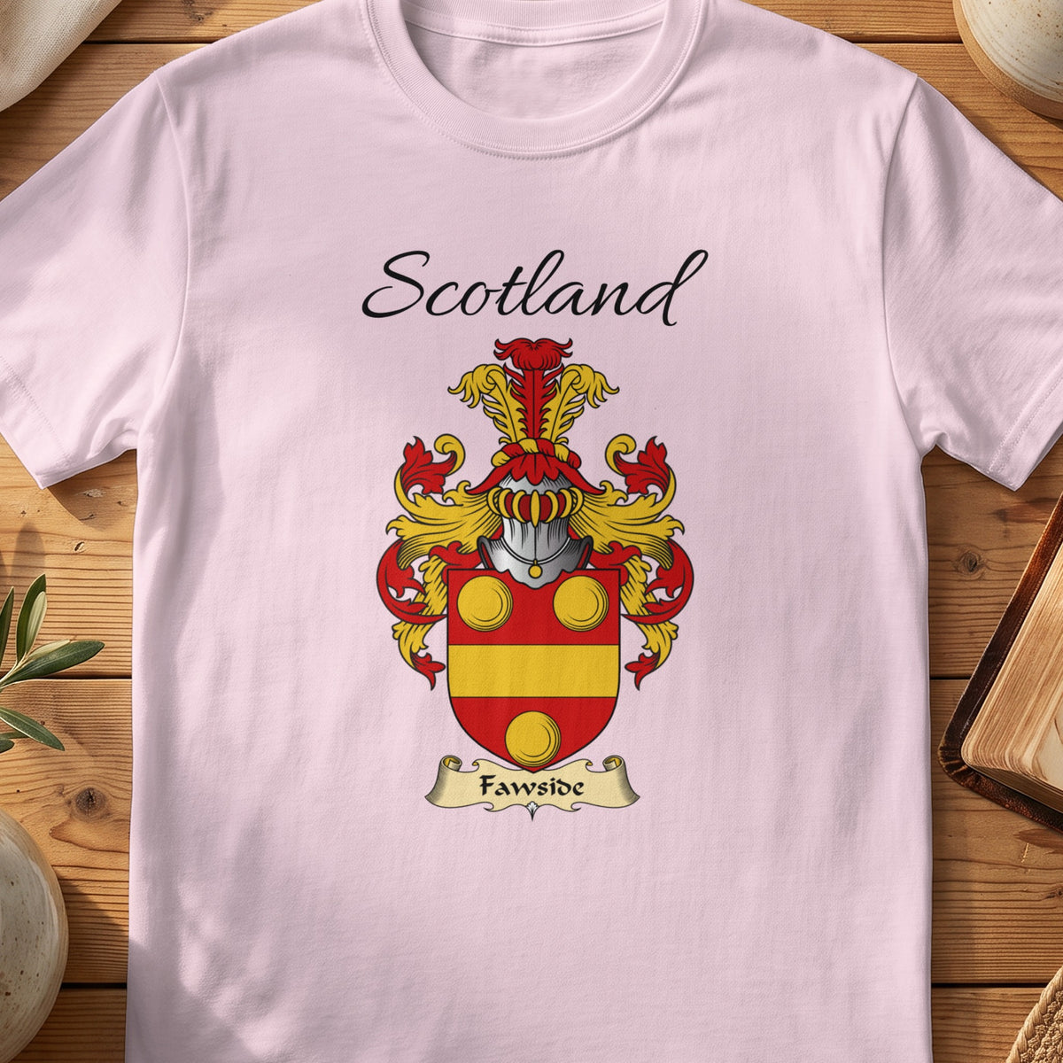 Light Pink Fawside Scottish family shield T-shirt featuring gold circles above a gold horizontal band